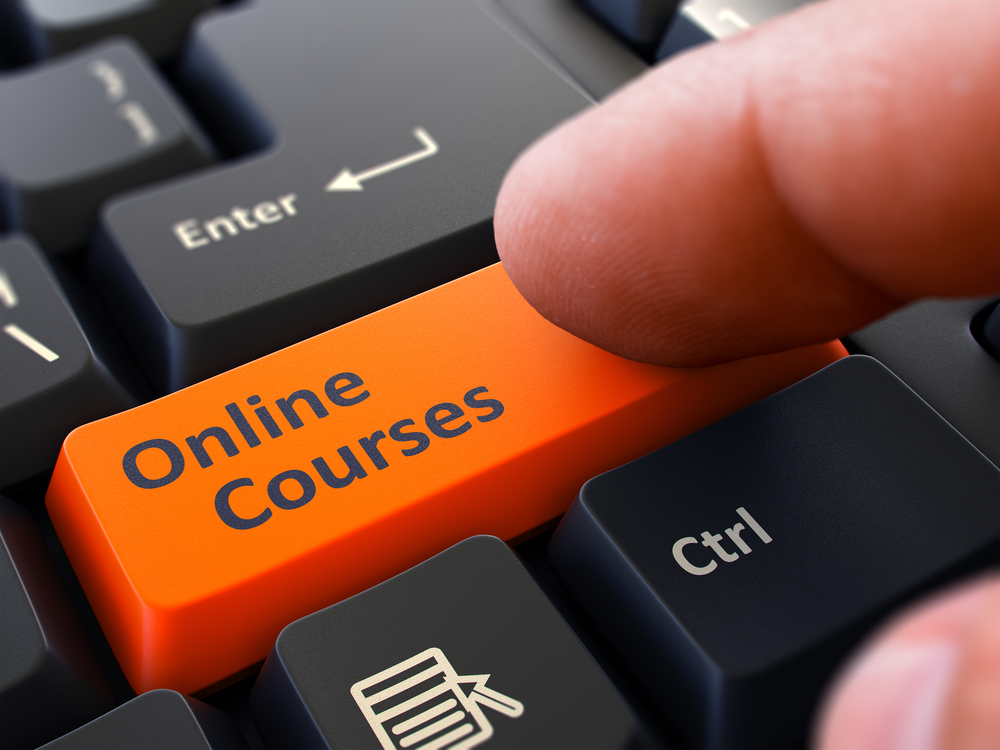 Online Courses orange key on computer keyboard